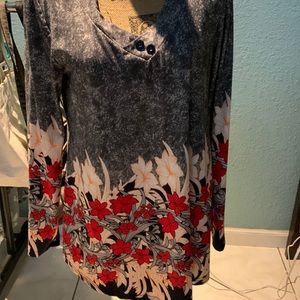 Djt top with decor on bottom and on bottom of sleeves